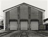 BECHER, BERND (1931-2007) & HILLA (1934- ) Suite of 12 photographs titled Industrial Facades.